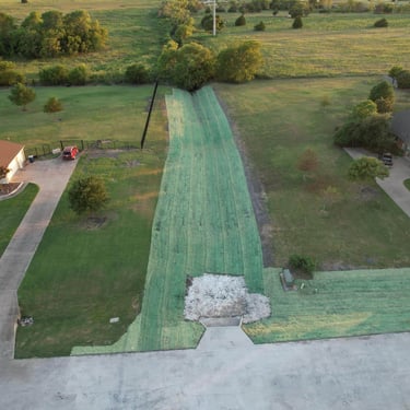 Aerial view of completed drainage channel.