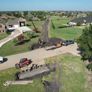 Residential culvert installation.