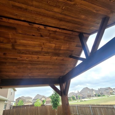 Close-up view of wooden gable patio roof.
