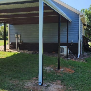 Metal Patio Next to Small Shed
