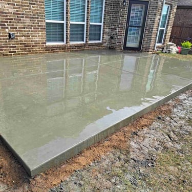 Freshly poured concrete patio.