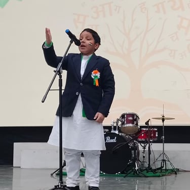 a man in a suit and tie is holding a microphone