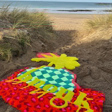 Photo d'un tapis personnalisé pour la marque et Ninon