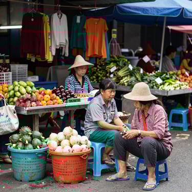 Satisfied customer smiling while holding car keys in front of a Mazda showroom.