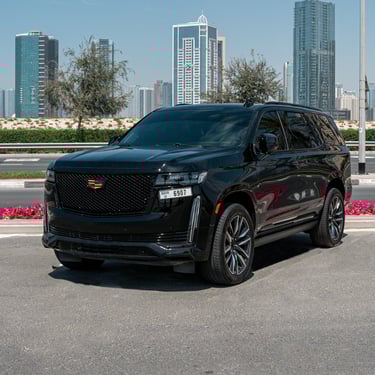 Rent a caddilac esclade with chauffeur in dubai