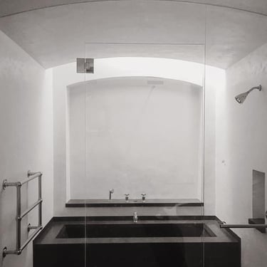 White Tadelakt bathroom with barrel clings - New York carriage house.