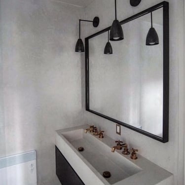 Grey Tadelakt walls with sink - Greenwich Village New York City.