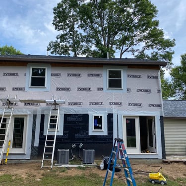 Old siding replacement in process with new durable siding in Clifton Park