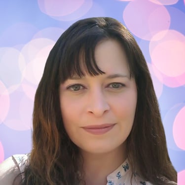 a woman with long hair and a white shirt