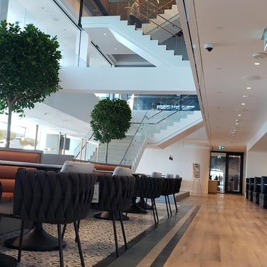 Ground Floor Lobby View of Metal Stairs with Wood Features, made by Pengelly