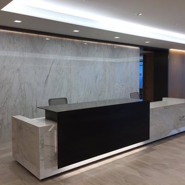 Front desk made of marble and metal, with metal done by Pengelly Iron Works 