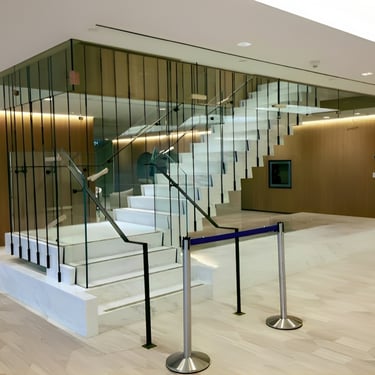Modern stairs in a head office, made by Pengelly (resolution boosted by ai)