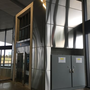 Top floor photo of TTC elevator cladding work done by Pengelly Iron Works