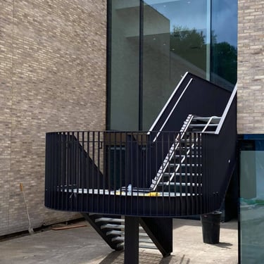 Exterior exit metal stairs, by Pengelly Iron Works