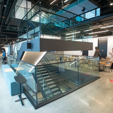 Another angle of Globe and Mail office staircase, showing off the lighting accents, fabricated by Pengelly Iron Works