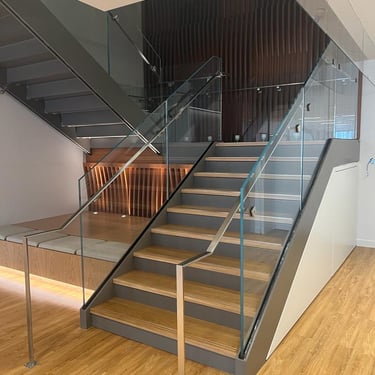 Another office metal staircase, with seating area attached, by Pengelly Iron Works