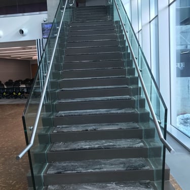 Metal and marble feature staircase done by Pengelly Iron Works