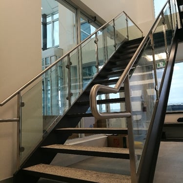 Older photo of metal office stairs by Pengelly Iron Works
