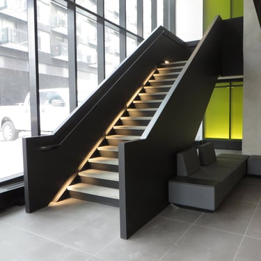 River City Apartments modern feature stair, with lighting accents, made by Pengelly Iron Works