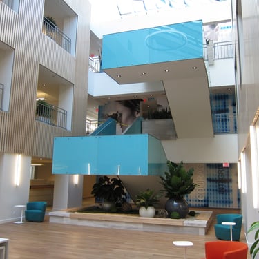 Blue modern feature stairs at Roche Canadian office, by Pengelly Iron Works