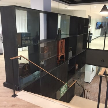 Office stairs, and shelving containing important historical objects at Rogers Head Office, by Pengelly Iron Works