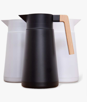 a black and white coffee pot with a wooden handle