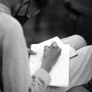 Student taking notes