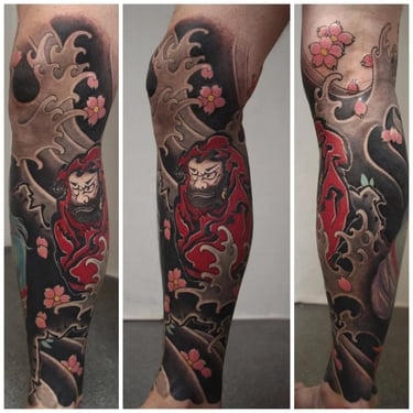 sakura tattoo sleeve germany artist japanese daruma