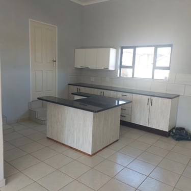 Painting and finishing touches in Wildtuin Park Estate home.