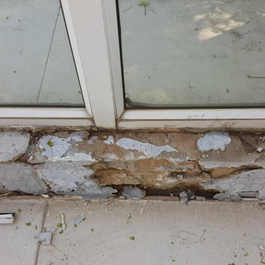 Moisture saturated areas after stripping of balcony tiles, Randburg
