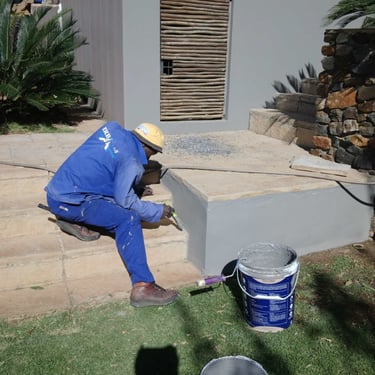 Precision cutting before exterior painting. Rustenburg, North West Province