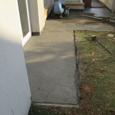 Screed application to channel water away from wall, damp preventative measures, Eagle Canyon Golf Estate, Honeydew
