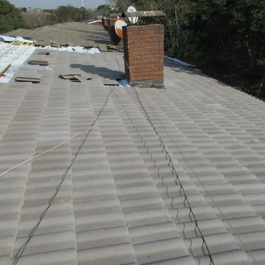 Advancing to completion of section of roof revamping project, Hyde Park, Sandton