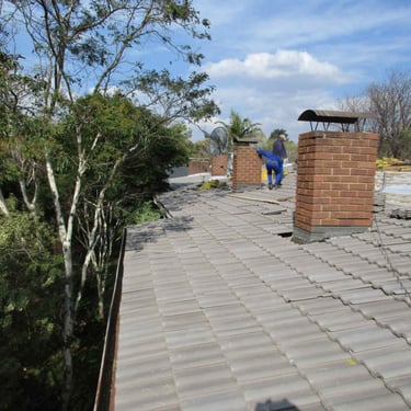 Laying of new roof tiles for roof revamping project, Hyde Park, Sandton