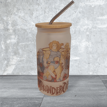 a glass tumbler with a straw
