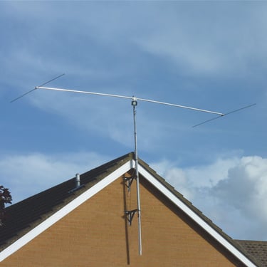 Pro Antennas Dual Beam Pro HF antenna mounted on the gable end of a house