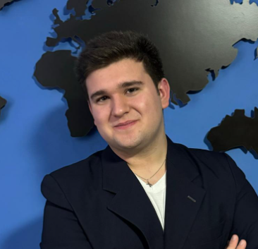 a man in a suit and a world map