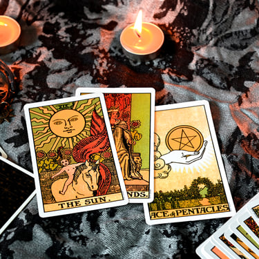 a tarot of tarot cards with candles and candles
