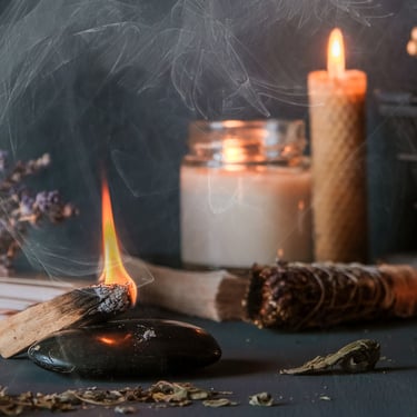 a candle with a candle and a candle on a table