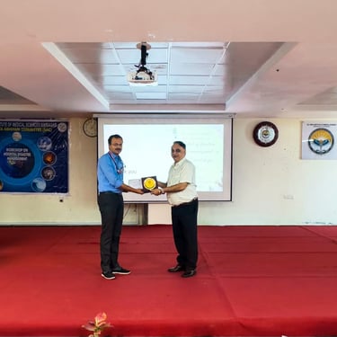 Receiving award from Prof. (Dr.) Vikas Bhatia, Executive Director at All India Institute of Medical Sciences, TG.
