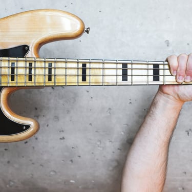 Triumphant bass player at Bass by Ear bass guitar lessons