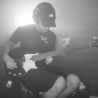 Teenager having Bass by Ear bass lesson