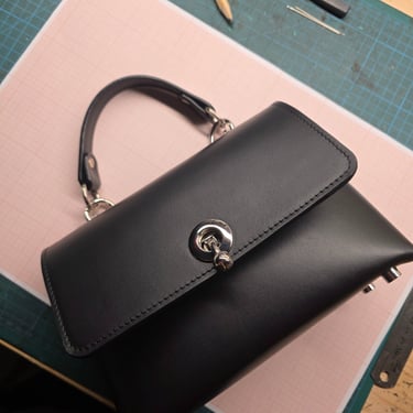 Black handmade top handle purse 