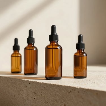 Minimalist amber glass skincare bottles on a warm textured stone shelf, soft morning light, clean shadows