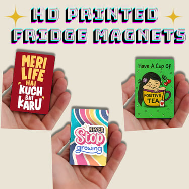 HD printed fridge magnets with motivational quotes and colorful designs being held in hands.