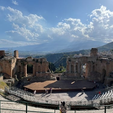 Wide-angle view of the Greek Theatre of Taormina, Sicily, Italy. Taken using an old iPhone