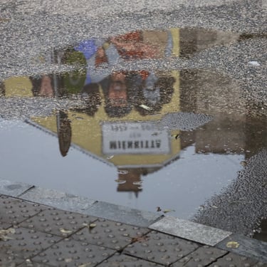Reflection of mural in Dob utca, in the inner 7th district (the Ghetto) of Budapest, viewed from Klauzál tér