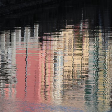 Impressionism 2: the wobbly reflection of buildings in one of the Navigli canals in Milan, Italy.
