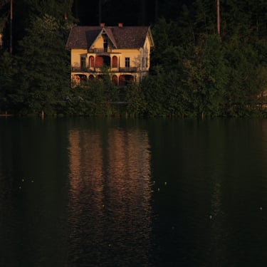 Artificial night at Lake Bled, Slovenia. Taken in broad sunlight using an absurdly short exposure time setting (1/1000).