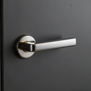 Precision satin chrome mortise lock handle on a minimalist charcoal door, high-contrast studio lighting, sharp metallic edges